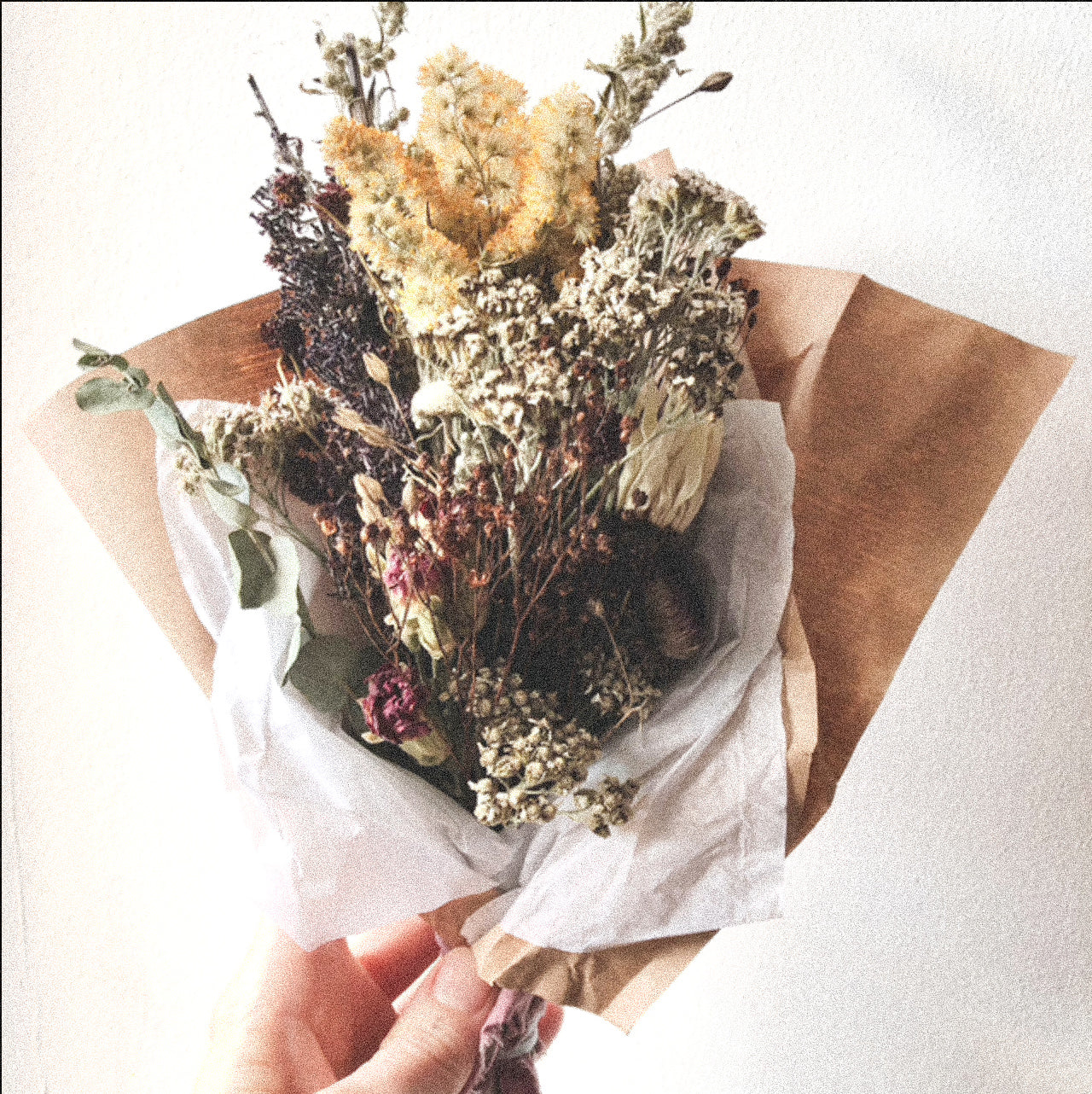 Dried wildflower posies of the seasons past