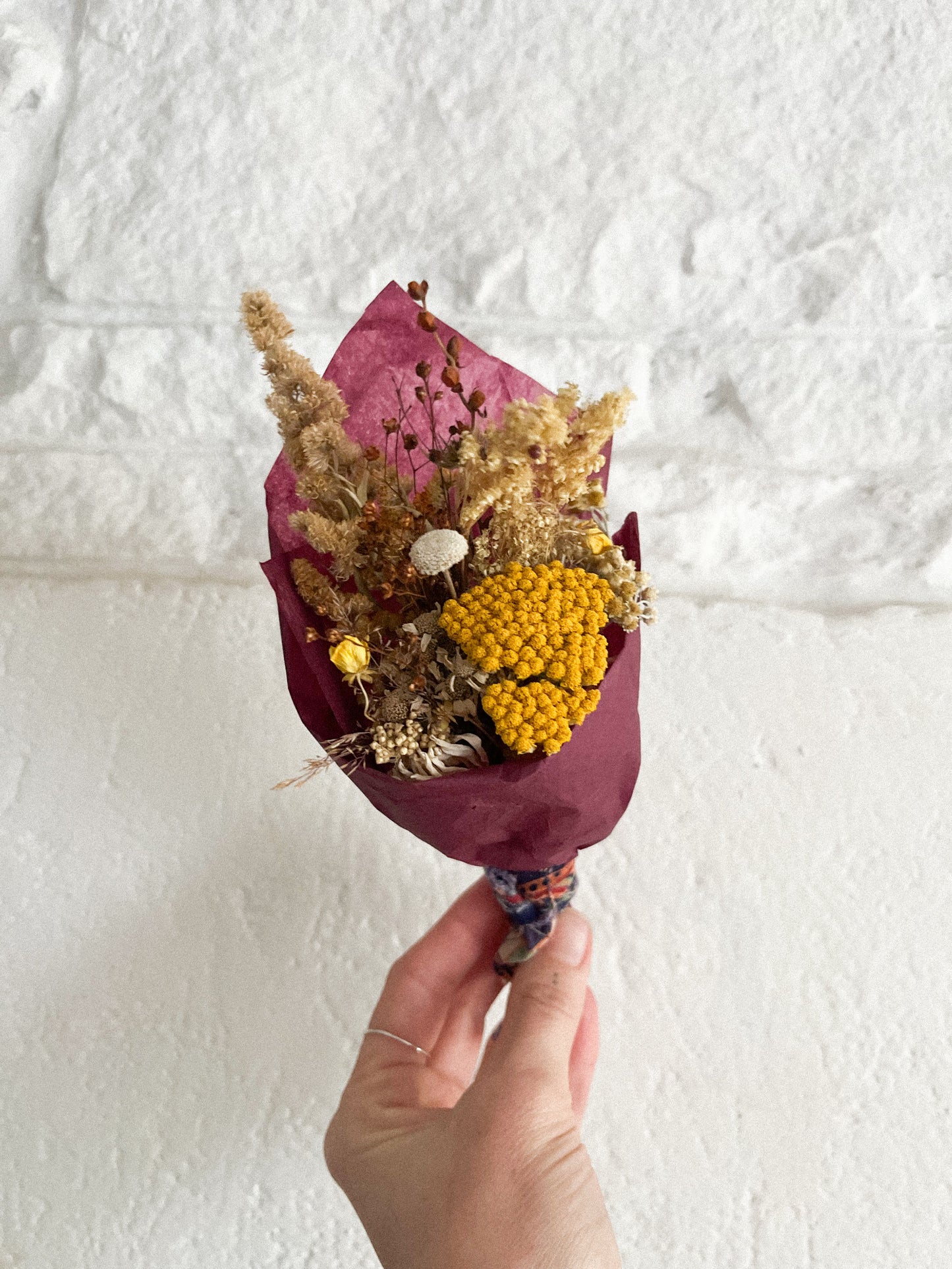 Dried wildflower posies of the seasons past