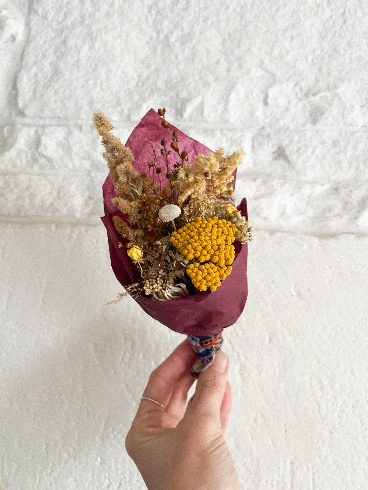 Dried wildflower posies of the seasons past