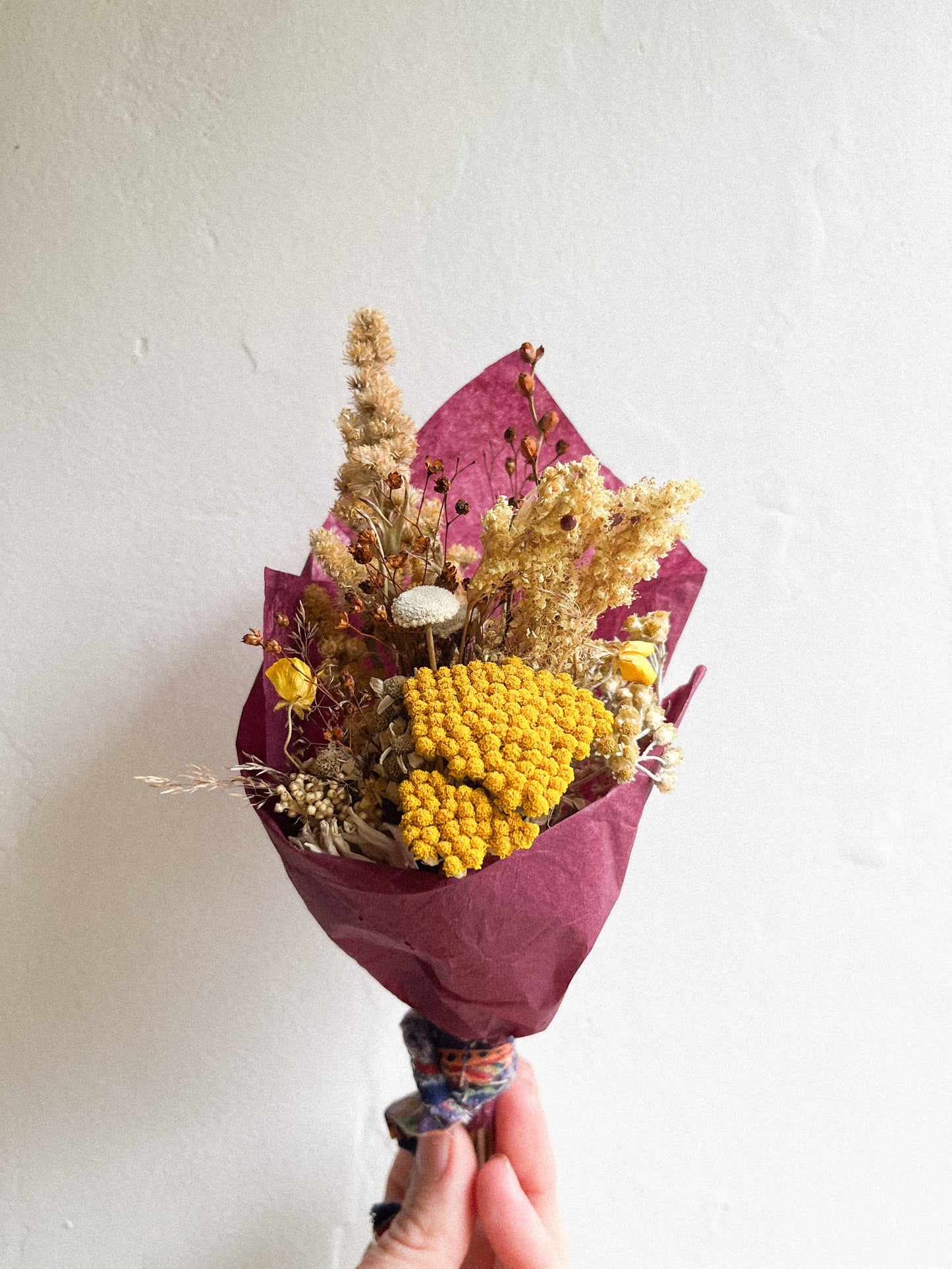 Dried wildflower posies of the seasons past